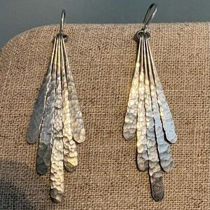These are the Flutter Drop Earrings in silver, designed by Lilygriffin Jewellery